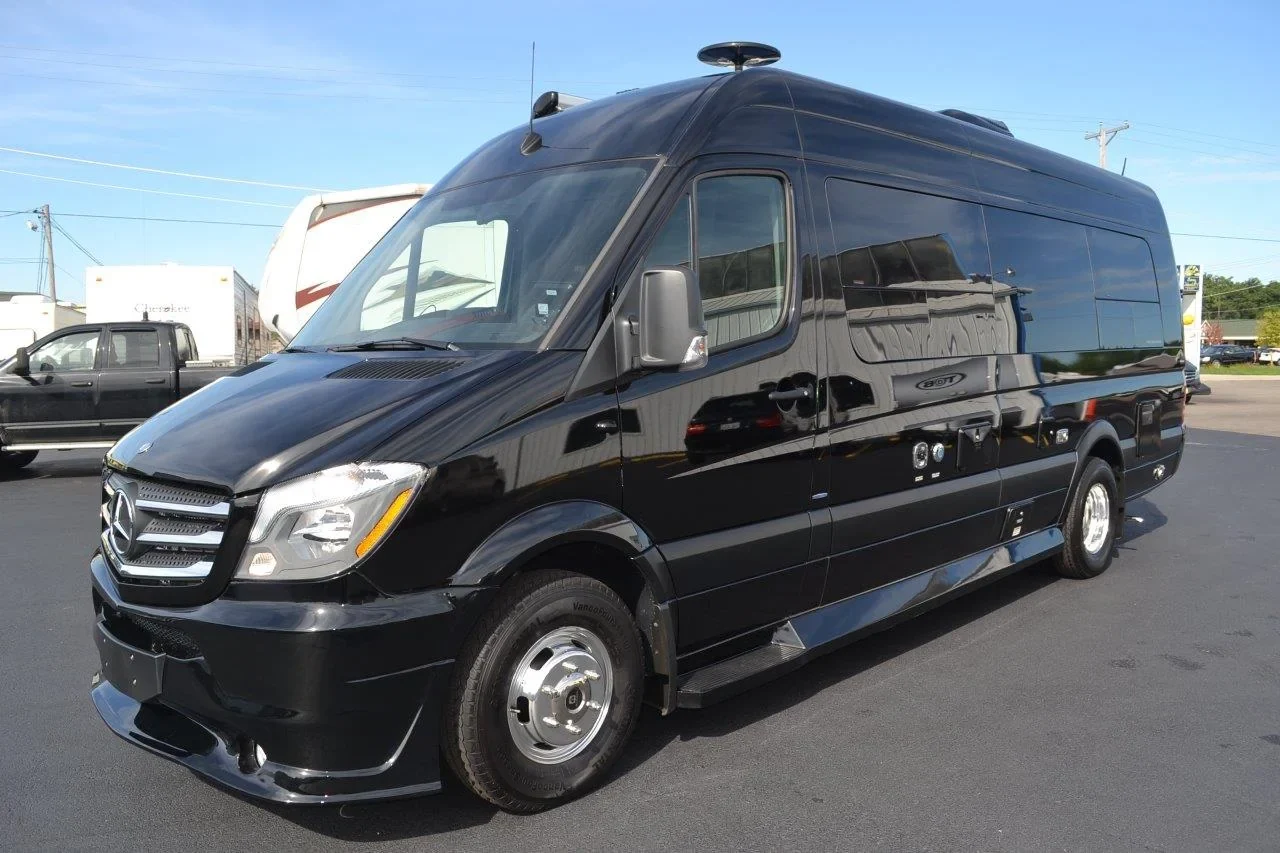 Black Mercedes Sprinter conversion viewed from the front and side