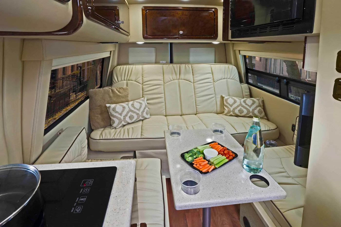 Sprinter conversion galley with countertop, cabinetry and appliance compartments